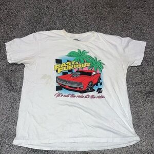 Universal White Graphic Tee with Red and Green Design